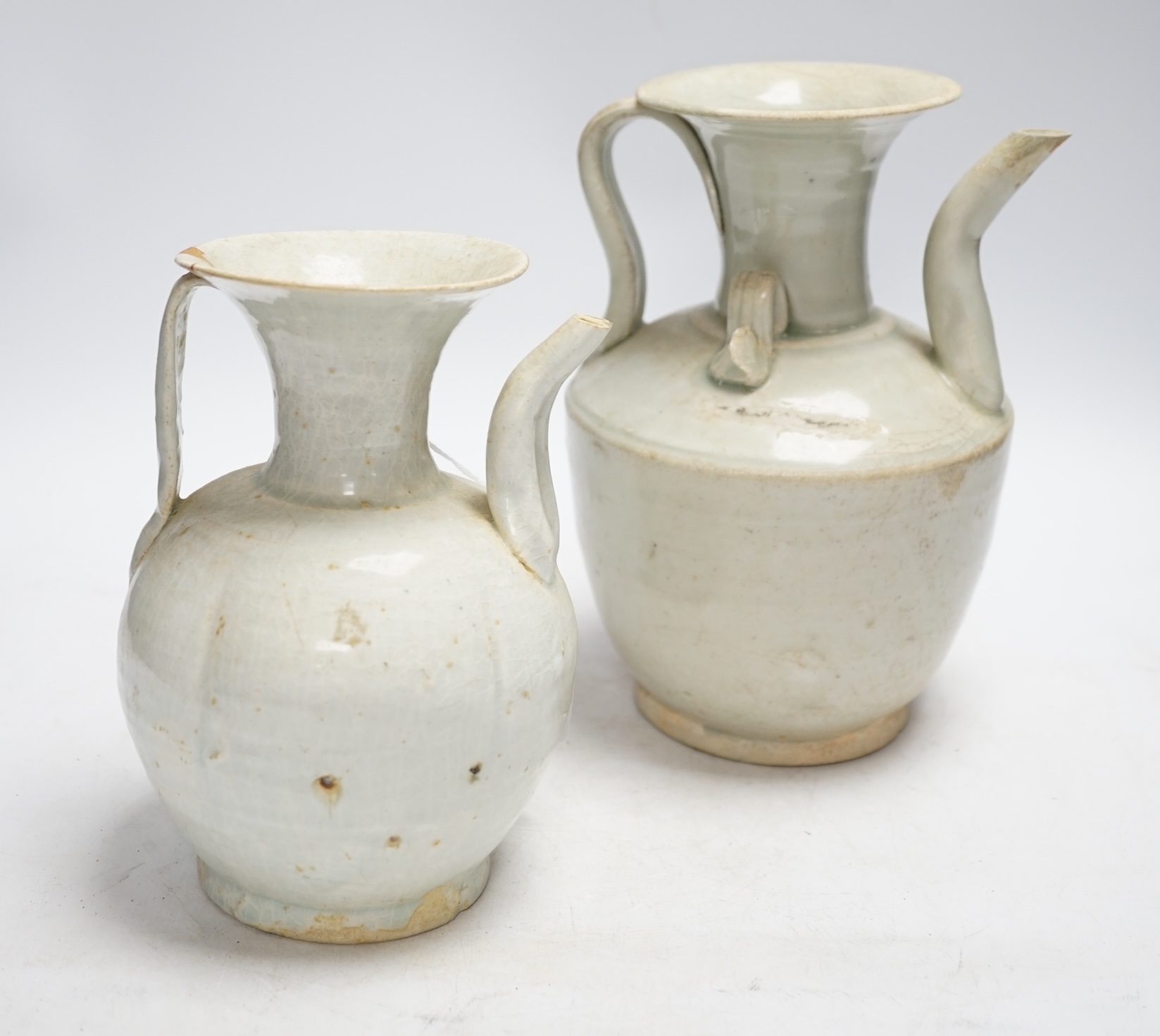 Two Chinese qingbai ewers, Song dynasty, one has Oxford thermoluminescence certificate, tallest 23cm